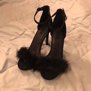 Black feathered heels